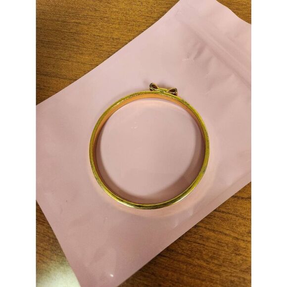 Kate Spade Goldtone bow bangle (PF) - Picture 7 of 7